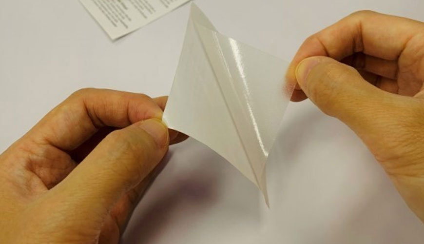 ASTM D6252 Basınca Duyarlı Etiket Stoklarının 90° Açıda Soyularak Yapışması için Test