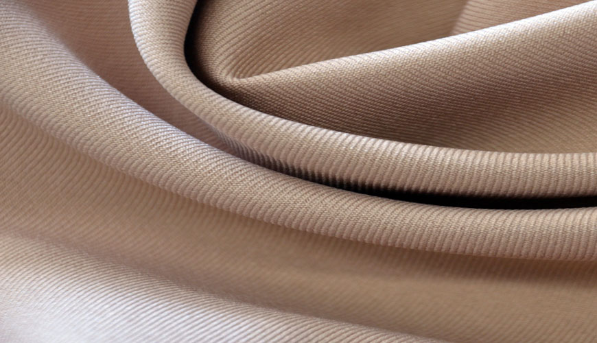DIN 53860 Testiranje tekstilij - Testiranje nagnjenosti tekstilnih tkanin k napihnjenosti