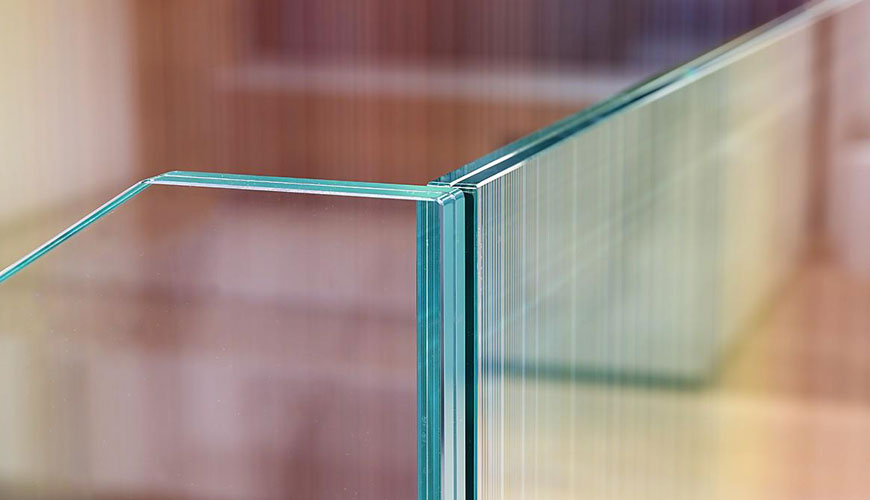 ISO 12543-1 Steklo v gradbeništvu - Laminirano steklo in lepljeno varnostno steklo - 1. del: Standardni preskus sestavnih delov
